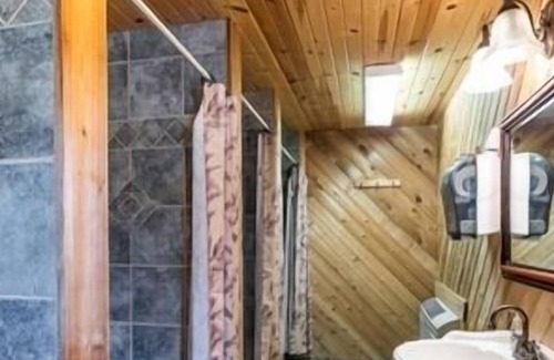 Neillsville Cabaña | Shared bunkhouse with individual private rooms with separate toilets and showers for men and women
