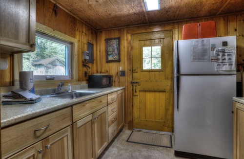 Rangeley Plantation Casa | Esta pequeña casa de campo es perfecta para una pareja o una familia pequeña que buscan retroceder en el tiempo y relajarse.