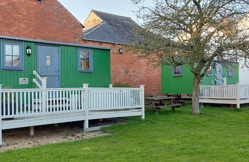 Wigton Cabaña | Shepherds hut with hot tub and onsite bistro and gym close to Hadrian's Wall and beach.