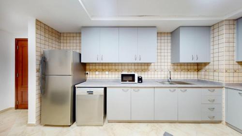 Motor City Apartamento | Sherlock House 2 - Peaceful One Bed in Motor City