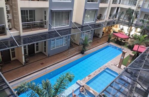 Malabanias Apartamento | Sheryll Escapes - La Grande1 BR 304 with balcony, Netflix & WiFi