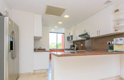 Área de Playacar Fase II Condominio | Sian Kaan by Stella Rentals