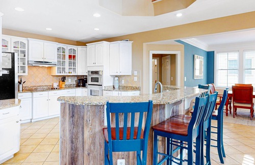 Sunset Island Casa | Side-by-side homes with bay views, resort pools, tennis, & gym - near beach