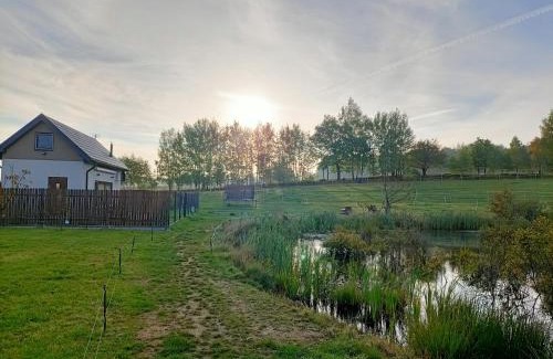 Przywidz Casa | Siedlisko Dwa Żurawie - Uroczy domek nad stawem, z kominkiem, obok konie