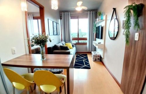 Bairro Lago Negro Apartamento | Siga Gramado - Apto faça tudo a pé! Vista! Tv smart! Ar Cond!