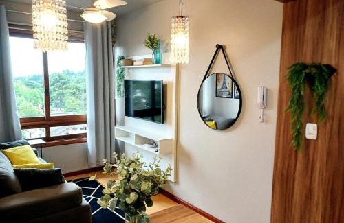Bairro Lago Negro Apartamento | Siga Gramado - Apto faça tudo a pé! Vista! Tv smart! Ar Cond!