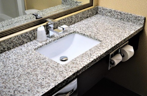 Melville Hotel | Sigma Inn & Suites