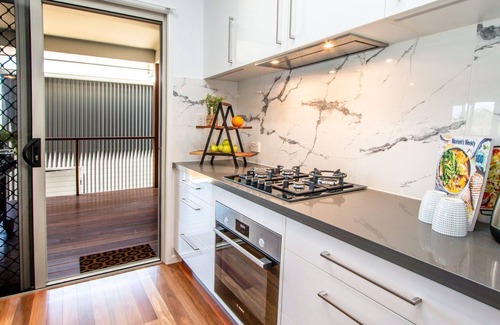 Agnes Water Casa | SILVER SANDS - air conditioned property with pool & under cover boat parking