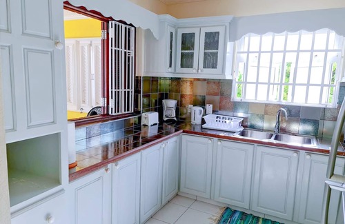 Silver Sands Apartamento | Silver Sands Beachfront Condo, Indoor & Outdoor Dining, Shared Patio - Bar & BBQ