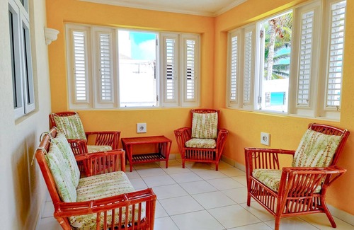 Silver Sands Apartamento | Silver Sands Beachfront Condo, Indoor & Outdoor Dining, Shared Patio - Bar & BBQ