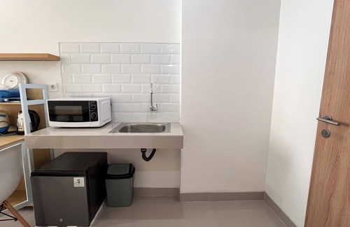 Makassar Apartamento | Simply Designed Studio (No Kitchen) At Bandaraya - Tallasa City Makassar Apartment