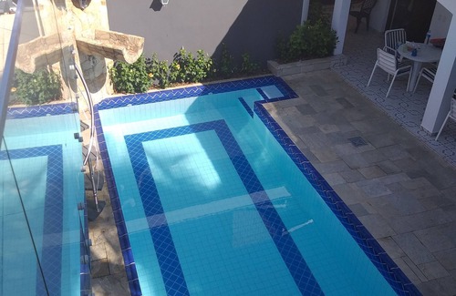 Jardim Centenario Casa | Acogedora casa de playa con piscina, barbacoa a 30 metros de la playa.