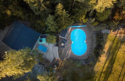 Espoo Villa | Sirpa's Artistic Nuuksio Retreat with Heated Pool