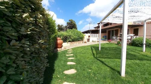 Porto Pollo Casa | Sissi House - Trilocale con Giardino - Porto Pollo