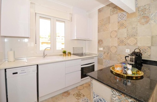 Punta Prima Apartamento | Sit back and relax in a stylish space just a few steps from the beach!