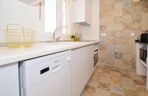 Punta Prima Apartamento | Sit back and relax in a stylish space just a few steps from the beach!