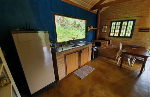 Goncalves Casa | Sitio Pindorama / Casa con vista panorámica