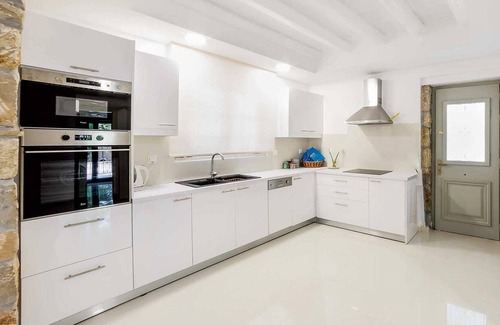 Drosia Casa | Situated within lush, beautifully maintained gardens, this renovated stone built property is a stunn