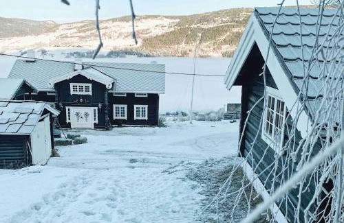 Hundorp Apartamento | Sjarmerende tømmerhytte på gårdstun