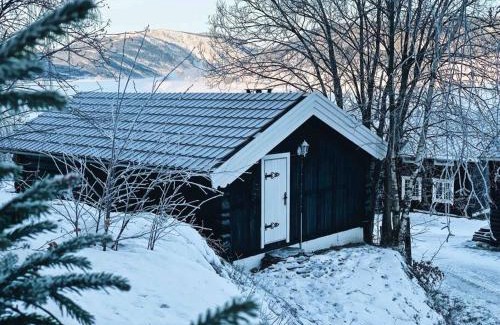 Hundorp Apartamento | Sjarmerende tømmerhytte på gårdstun