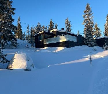 Sjusjoen Casa | Sjusjøstua by Norgesbooking - cabin close to cross country trails