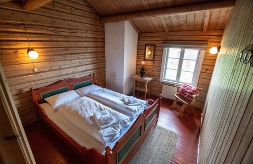 Ringebu Hotel | Skotten Seter Bed Husky