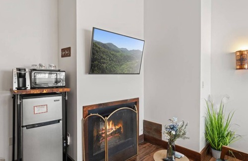 Townsend Hotel | Sky-Filled King Suite | Walk-In Shower | Private Balcony