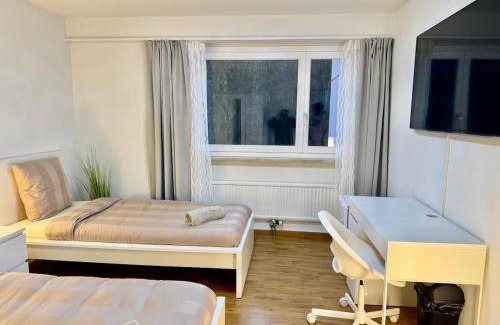 Nussbaumen Apartamento | Skyline Retreat Jedes Zimmer mit TV