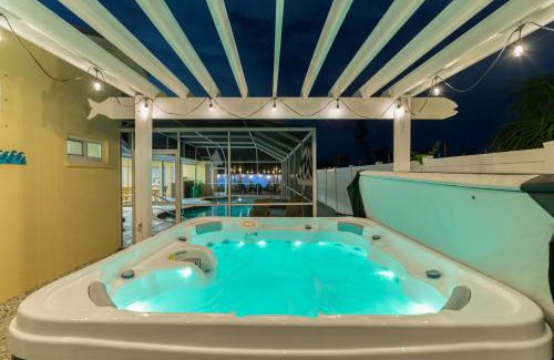 Palma Sola Casa | Sleeps 16 Heated Pool Hot Tub Fire Pit Putt Putt
