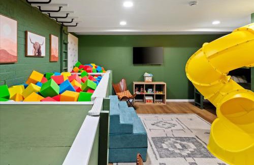 Copperwood Casa | Slide into Fun Pool Games Fire Pit Sport Court