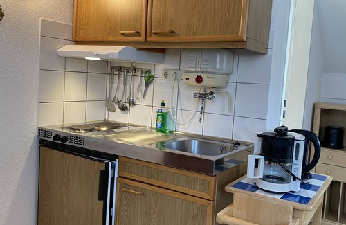 Zweifall Apartamento | Pequeño apartamento en el último piso en una casa de piedra catalogada en Eifel / Aachen