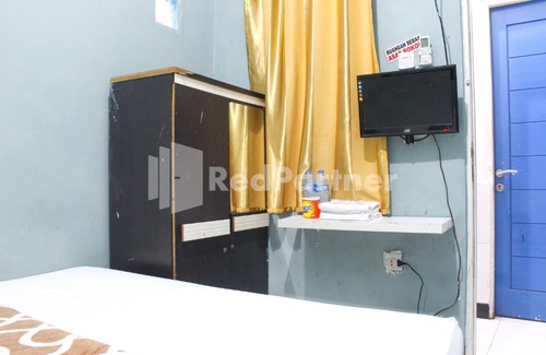 Jelambar Hotel | Snow White Residence near Grogol Mitra RedDoorz