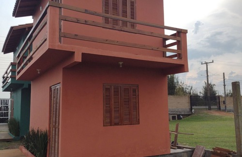 Passo de Torres Casa | Sobrado a Beira do rio Manpituba com Piscima Quiosques com Churrasqueira