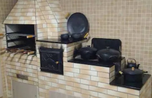 Novo Mundo Casa | Sobrado Climatizado, Amplo Espaço e Conectividade