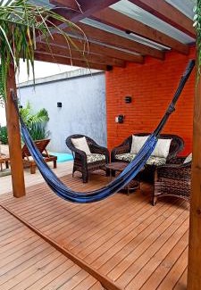 Muquem Casa | Sobrado com 3 Suítes, Piscina, Sala de Jogos, Playground, Garagem para 4 Carros