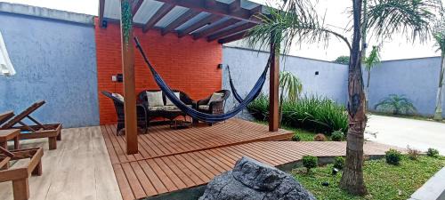 Muquem Casa | Sobrado com 3 Suítes, Piscina, Sala de Jogos, Playground, Garagem para 4 Carros