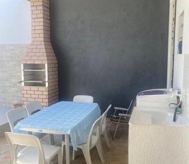 Jardim Virginia Casa | Sobrado com piscina e área gourmet na praia da Enseada