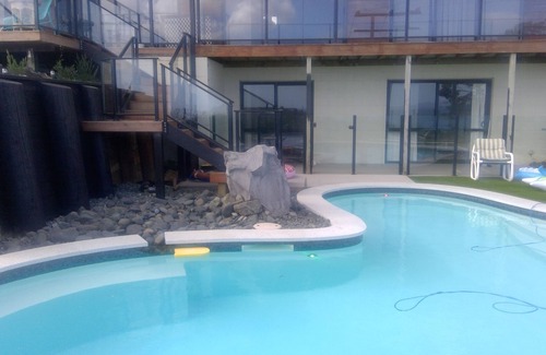 Doubtless Bay Apartamento | Solitude with a pool and spectacular views pet friendly