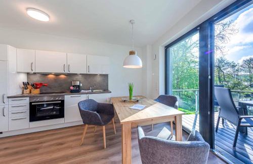 Krakow am See Apartamento | Sonnengruß - Stilvolles Apartment mit Balkon, Kamin & Wellness-Flair am Krakower See