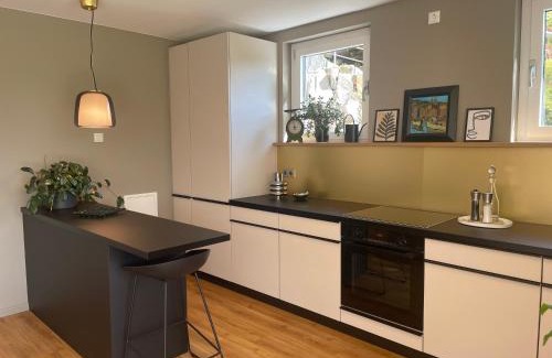 Thiergarten Apartamento | SONNENWEG Designwohnung mit Gartenblick