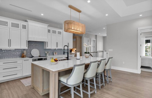 Coury Casa | Sophisticated 5-bedroom, elevator, 50' dock, heated pool/spa, sleep 12