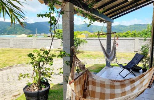 Pantano do Sul Casa | Sossego e pé na areia no Sul da Ilha