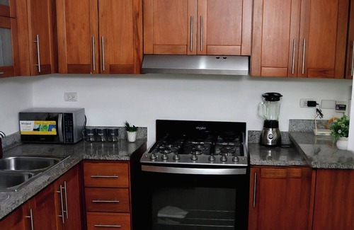 Llanos de Gurabo I Apartamento | Spacious 3-bedroom and 2 bathroom with WiFi, fitness room, pool area santiagoRD