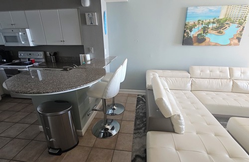 Panama City Beach Hotel | Spacious 2 Bedroom Beachfront view Downtown Panama City Beach steps from beach.