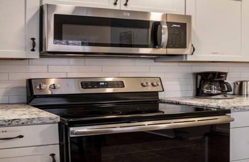 Downtown Louisville Casa | Spacious 3BR House w/ Backyard in NULU CozySuites