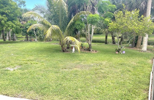 Lake Worth Casa | Spacious 4-bedroom country house in charming Wellington with WiFi, AC
