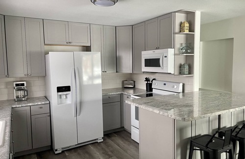 Spirit Lake Casa | Spacious 4-BR House, Lake and Park across the street!