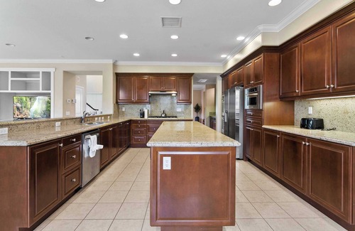 Eastvale Casa | Spacious 5BR Home in Eastvale Chef's Kitchen, Backyard & Prime Location #40809