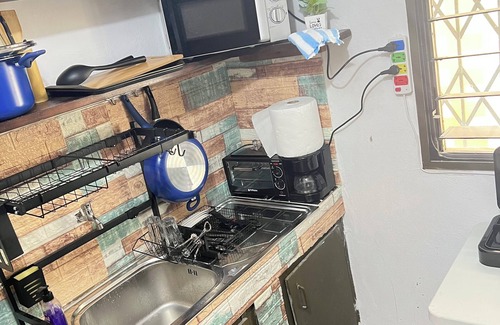 Cocody Apartamento | Spacious and cozy apartment; secure & chic neighborhood; close to all amneties!