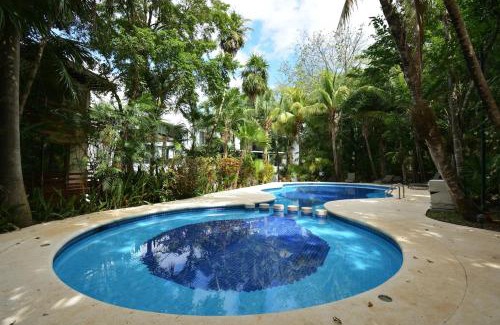 Playacar Villa | Spacious and luxurious villa with 4 bedrooms, swimming pool, tennis court, and beach within walking distance